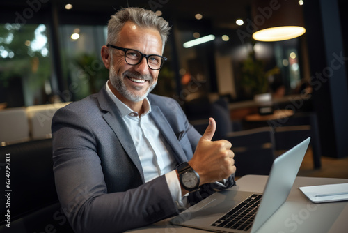 A businessman exudes pride and contentment as he watches a video testimonial from a satisfied customer. Concept of customer satisfaction and testimonials. Generative Ai. photo