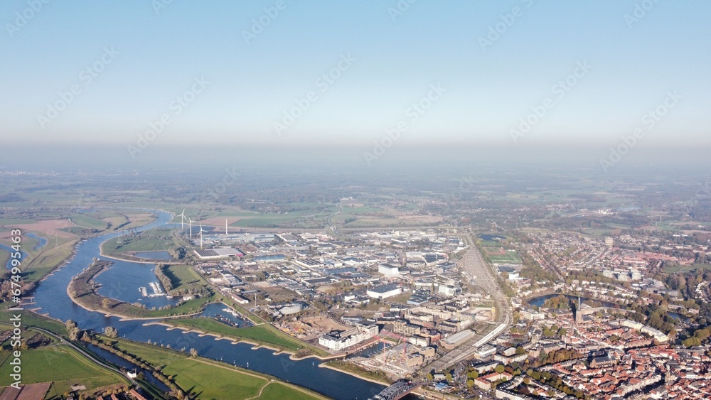 Aerial shot of a river near city buildings