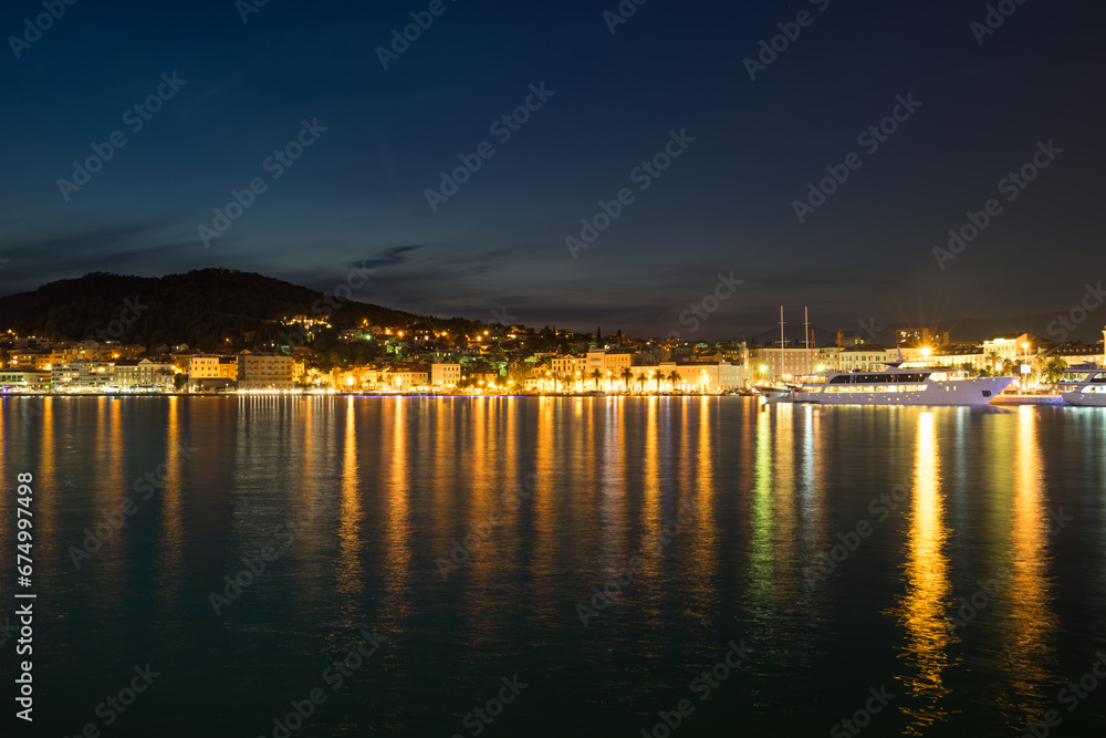 Evening skyline of promenade Riva  and Diocletian Palace in Split. Croatia