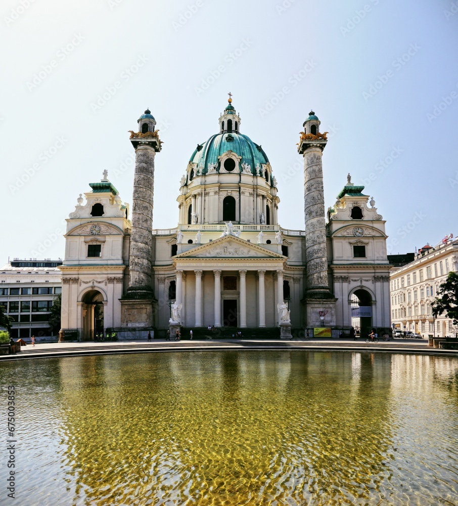 Stunning view of the historic Karls Church near a pond in Vienna, Austria