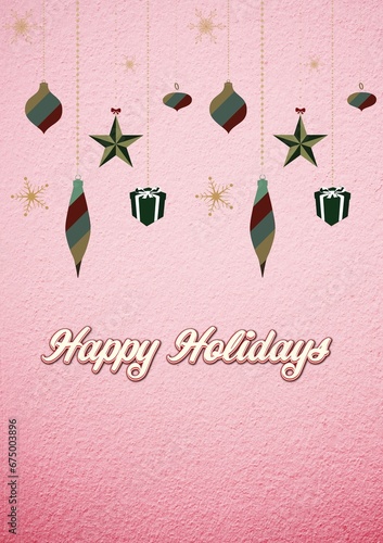 Composition of happy holidays text over christmas decorations
