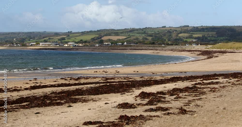 wide shot of Marazion beach at mounts Bay wide shot of Marazion beach at mounts Bay