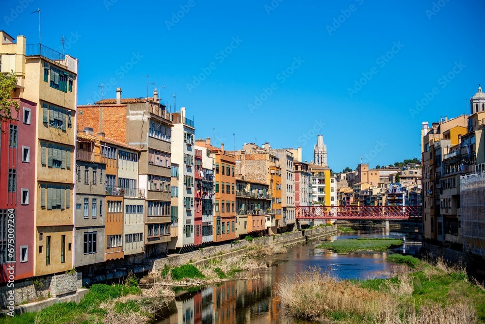 colorful buildings line in Girona, Catalonia, Spain
