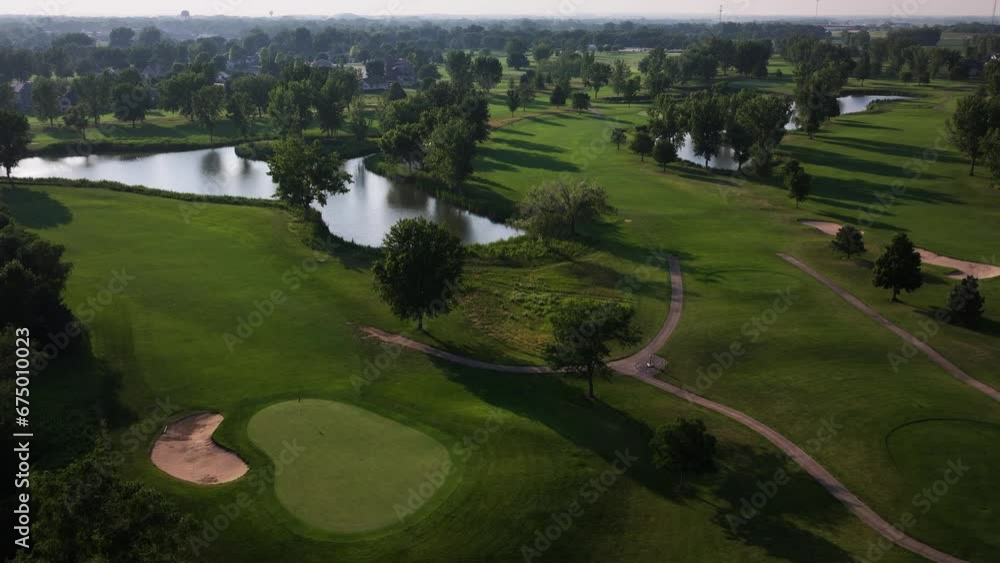 Drone view of beautiful green landscape with trees and pond Drone view of beautiful green landscape with trees and pond