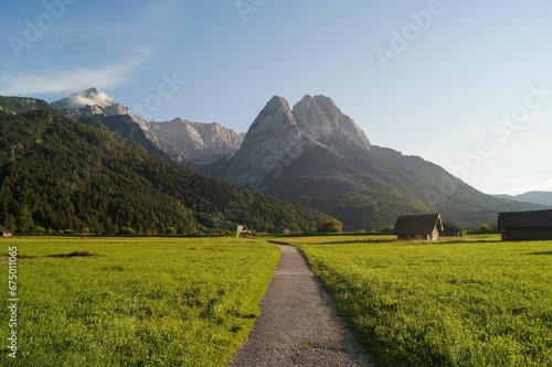 Idyllic scene featuring a winding path surrounded by Bavarian Alps, Zugspitze, Germany