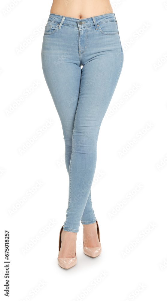 Woman wearing stylish light blue jeans and high heels shoes on white background, closeup Woman wearing stylish light blue jeans and high heels shoes on white background, closeup