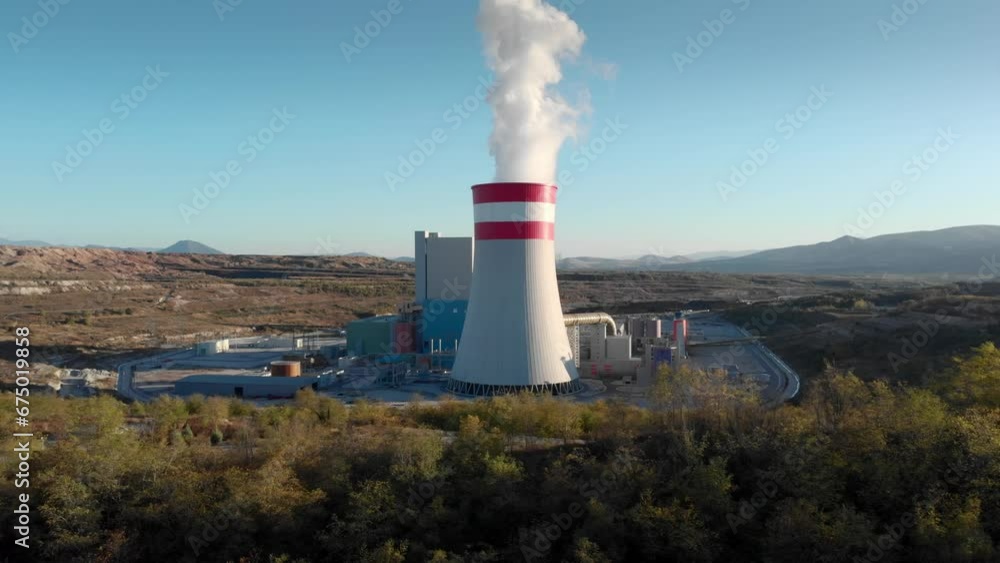 Drone Smoke from a coal fired power station dolly panning right Sunset blue sky Drone Smoke from a coal fired power station dolly panning right Sunset blue sky
