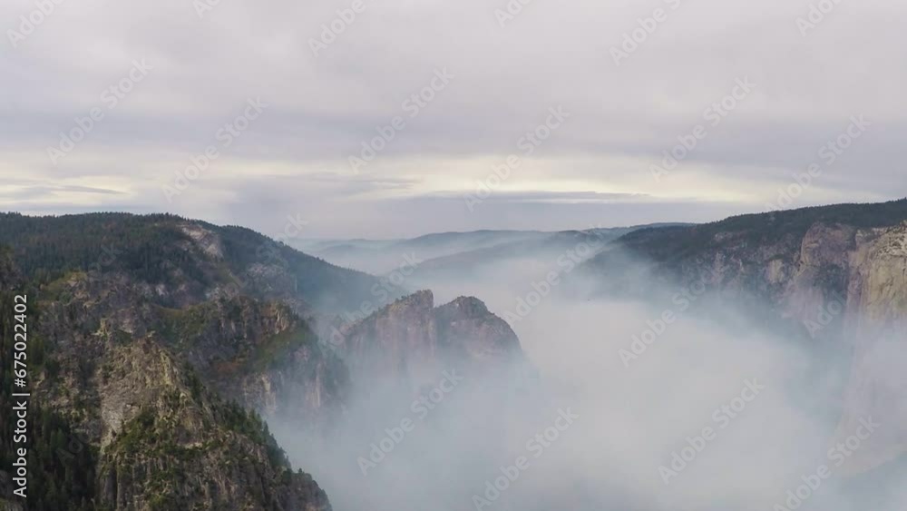 Fog in Valley of Yosemite National Park during Cloudy Day in Nature Fog in Valley of Yosemite National Park during Cloudy Day in Nature