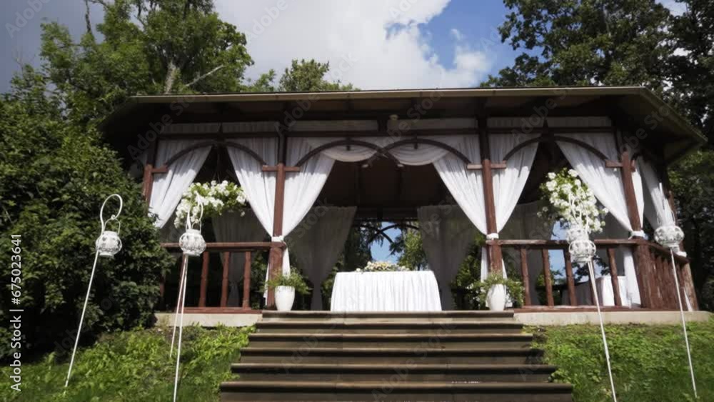 Slow zoom on Jaunmoku castle wedding arbor ceremony place in forest Slow zoom on Jaunmoku castle wedding arbor ceremony place in forest