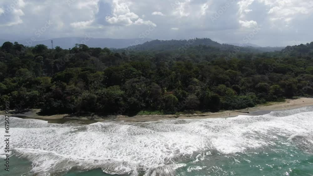 Costa Rica beach drone view showing sea, shore and forest Costa Rica beach drone view showing sea, shore and forest