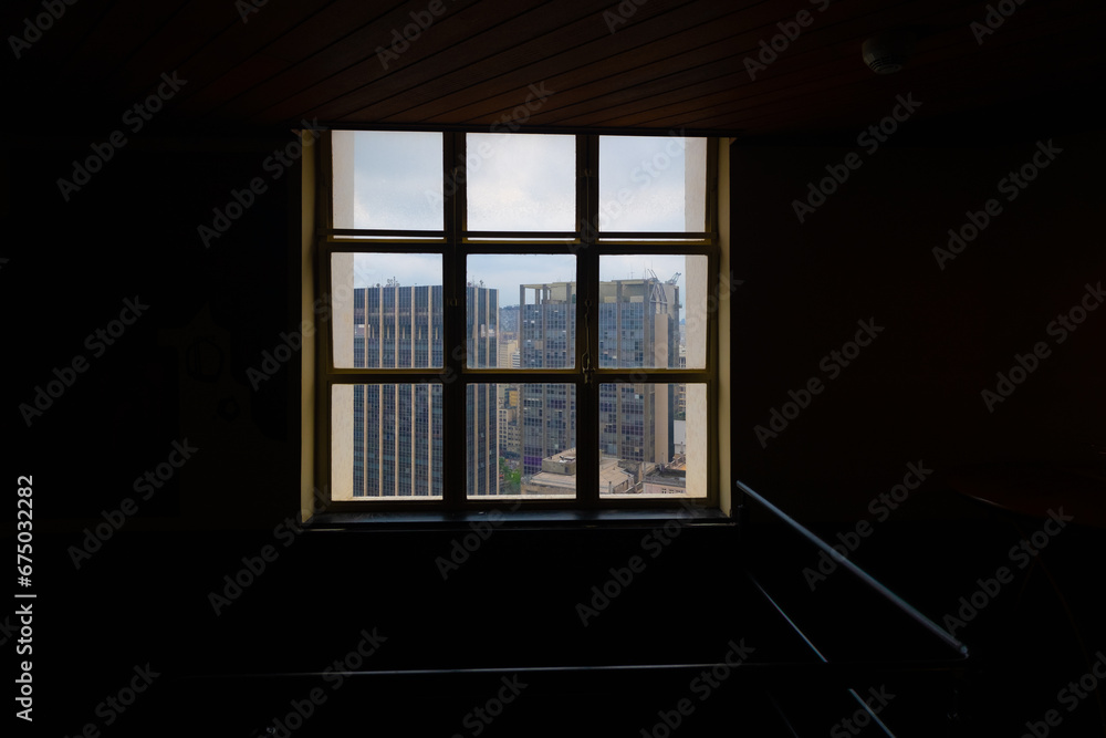 View of buildings in the city center of São Paulo through a window View of buildings in the city center of São Paulo through a window