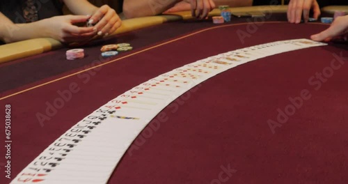 Casino Poker table with chips and cards, shallow depth of field