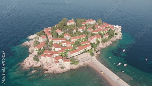 ariel footage of the famous hotel island called sevti stefan in montegro during a hot and sunny summers day. photo