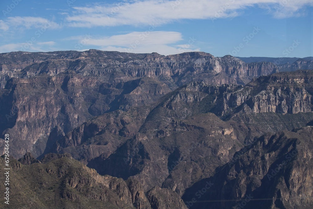 Scenic view of the Copper Canyon in Mexico with rugged mountain range on a sunny day
