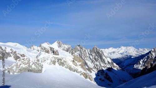 Aerial view of the majestic Monte Bianco mountain range, featuring a stunning winter landscape