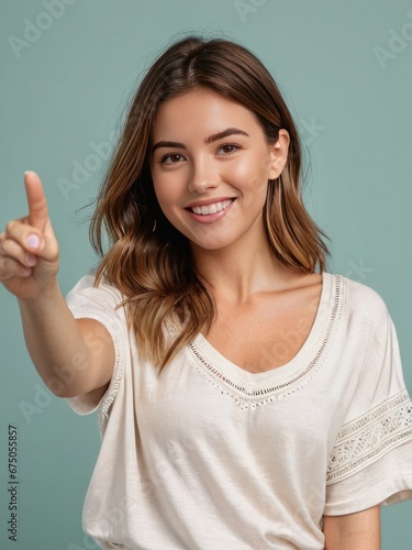 Wallpaper Mural attractive young woman pointing hand Torontodigital.ca