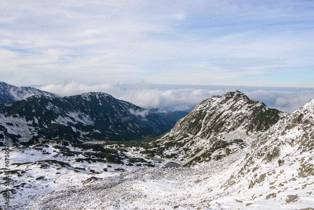 Landscape of the Bucegi Mountains covered in the snow in Romania