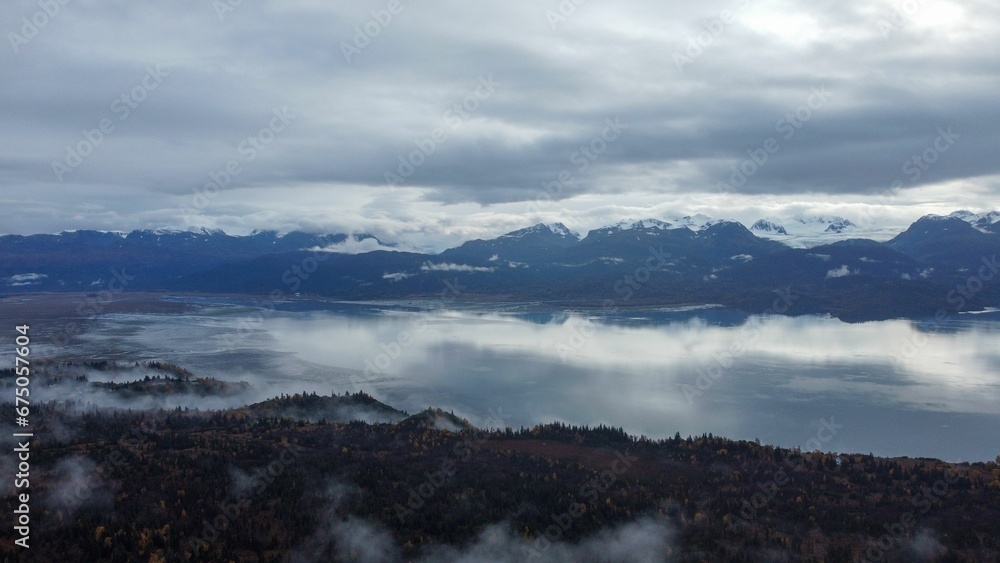 Breathtaking view of the Kachemak Bay in Homer, Alaska shrouded in a mysterious fog