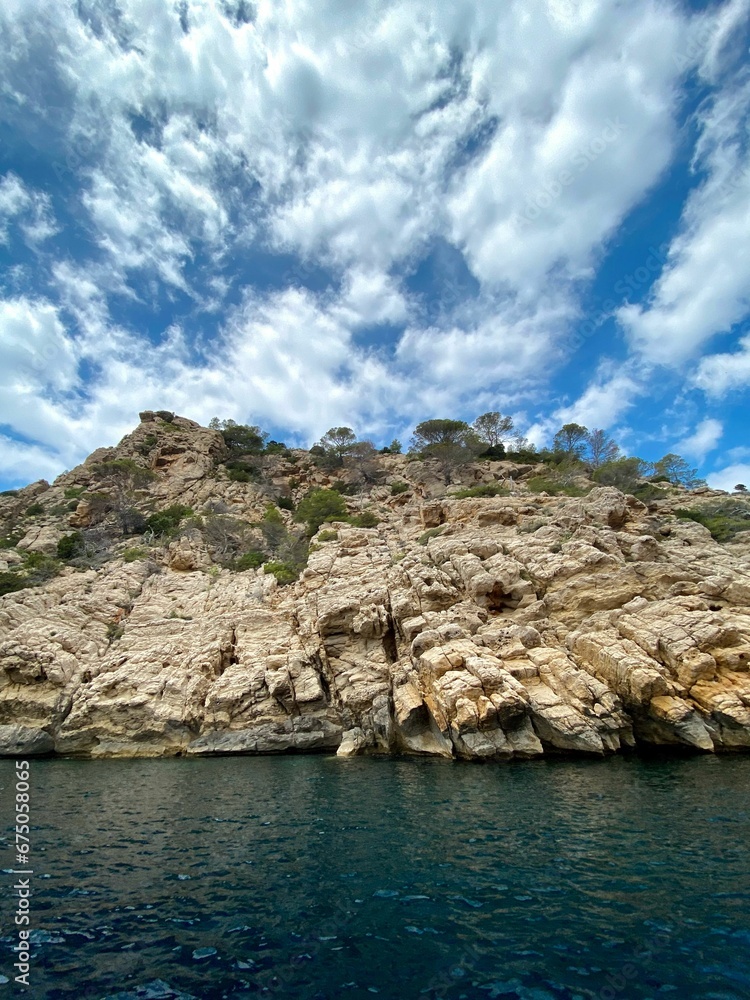 Beautiful shot of scenic rocky cliffs on the shore of Ibiza