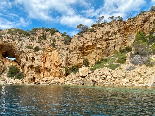 Beautiful shot of scenic rocky cliffs on the shore of Ibiza