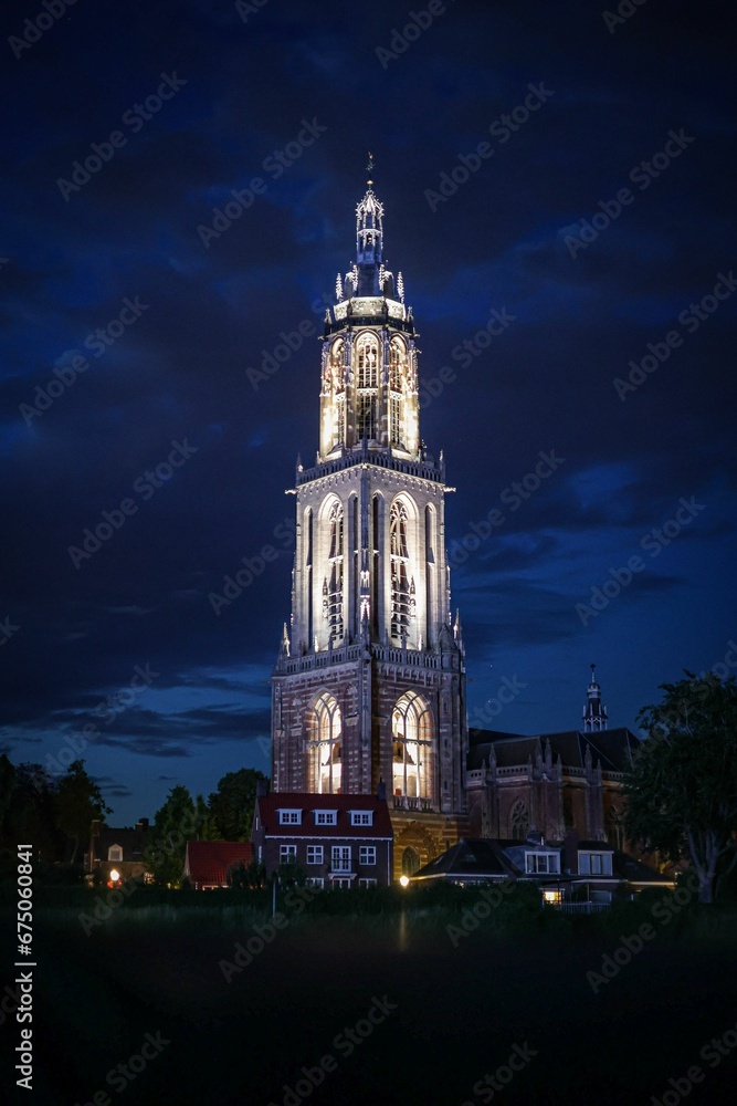 Vertical of Cunerakerk in Rhenen, Netherlands illuminated at night