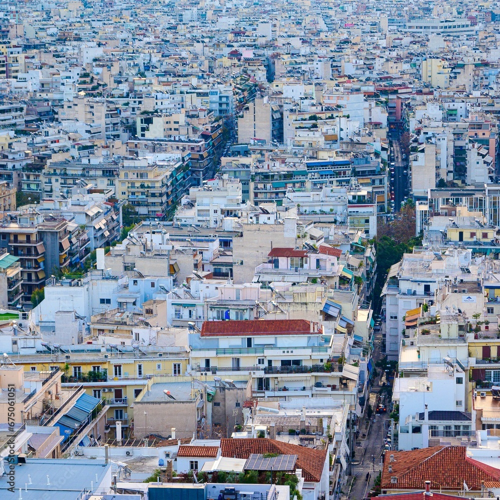 Aerial shot of the neighborhood of Neos Kosmos in Athens, Greece wiith buildings and roofs