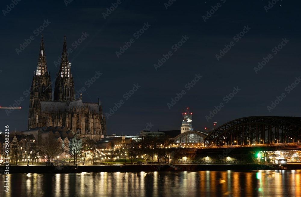 a beautiful night view of cologne cathedral and the rhine river