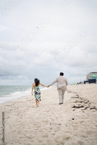 Closeup of a loving couple embracing on a beach, enjoying a romantic moment together