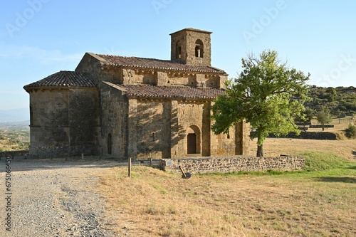 Scenic view of an old stone church in green mountains