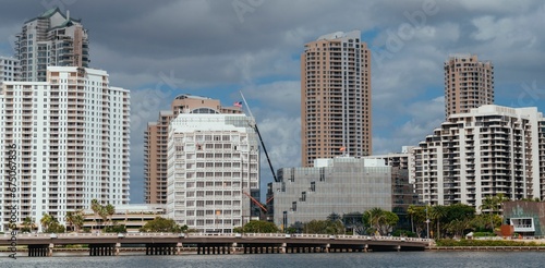 Scenic view of a bustling city skyline featuring a cluster of tall, modern skyscrapers
