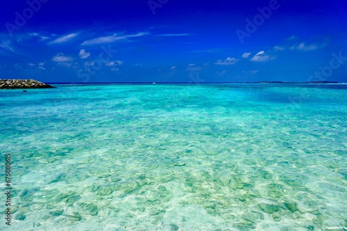 Tranquil body of water with a vibrant blue and green color palette