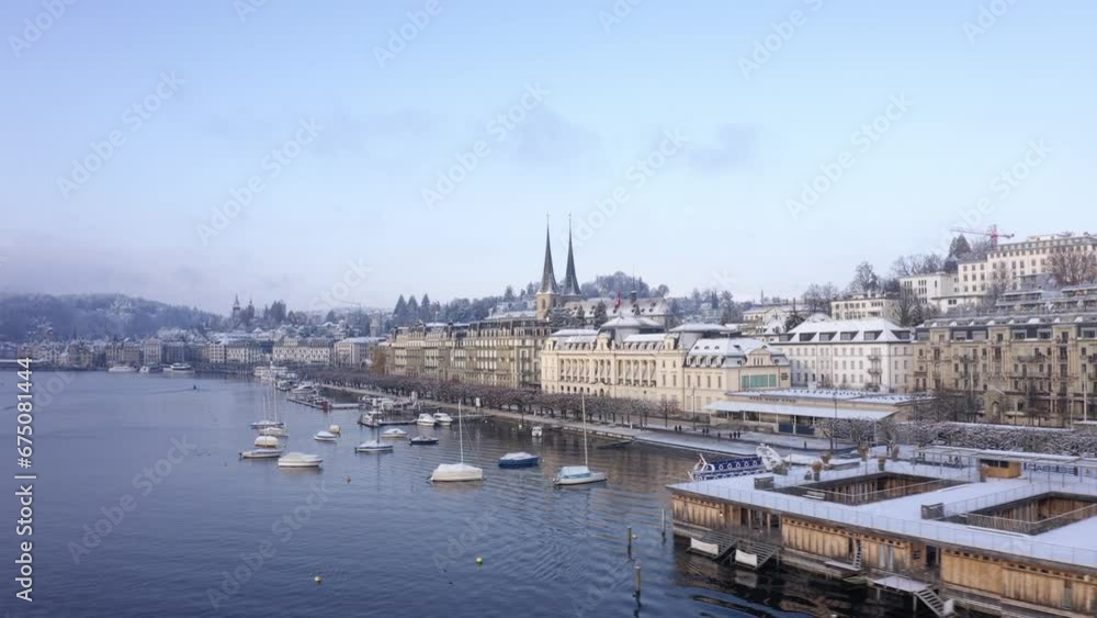 Lucerne, Switzerland. Drone Shot of City Waterfront, Hotels and St. Leodegar Church Lucerne, Switzerland. Drone Shot of City Waterfront, Hotels and St. Leodegar Church