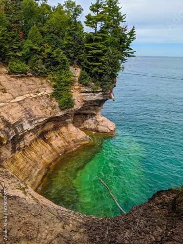 Tranquil body of water situated between rocks overlooking the National Lakeshore, Michigan