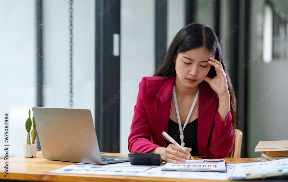 tired business woman sleepy and bored from sitting at a desk for a long time and has office syndrome tired business woman sleepy and bored from sitting at a desk for a long time and has office syndrome