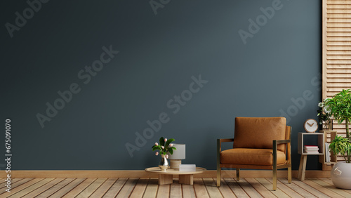 Dark blue living room interior with cozy leather armchair photo