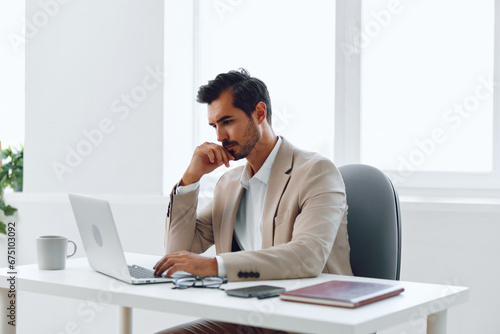 Office man laptop businessman happy business working computer smiling white executive manager sitting