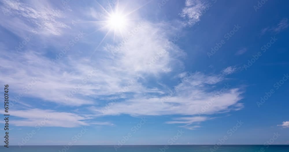 Timelapse nature landscape of Beach sea and clouds moving in the blue sky in good weather day.Sunlight reflected on the sea surface.Clouds traveling over the wide space of clear blue sky background Timelapse nature landscape of Beach sea and clouds moving in the blue sky in good weather day.Sunlight reflected on the sea surface.Clouds traveling over the wide space of clear blue sky background