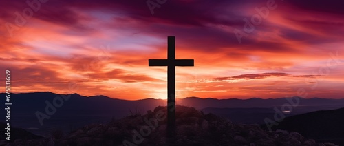 Concept or conceptual wood cross or religion symbol shape over a sunset sky background banner