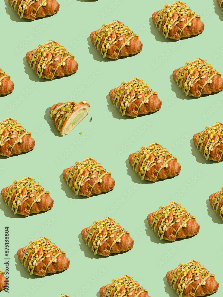 croissant with pistachio on a green background croissant with pistachio on a green background