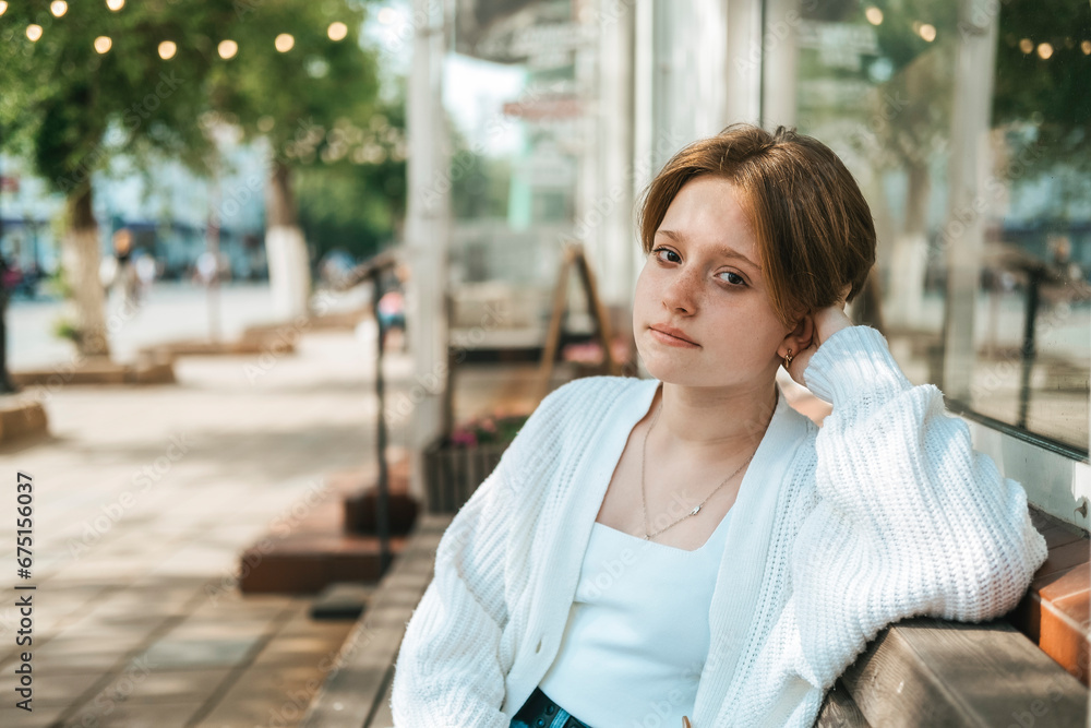 A teenage girl sports edgy short hair and vibrant red hues, portrait a testament to expressive youth A teenage girl sports edgy short hair and vibrant red hues, portrait a testament to expressive youth