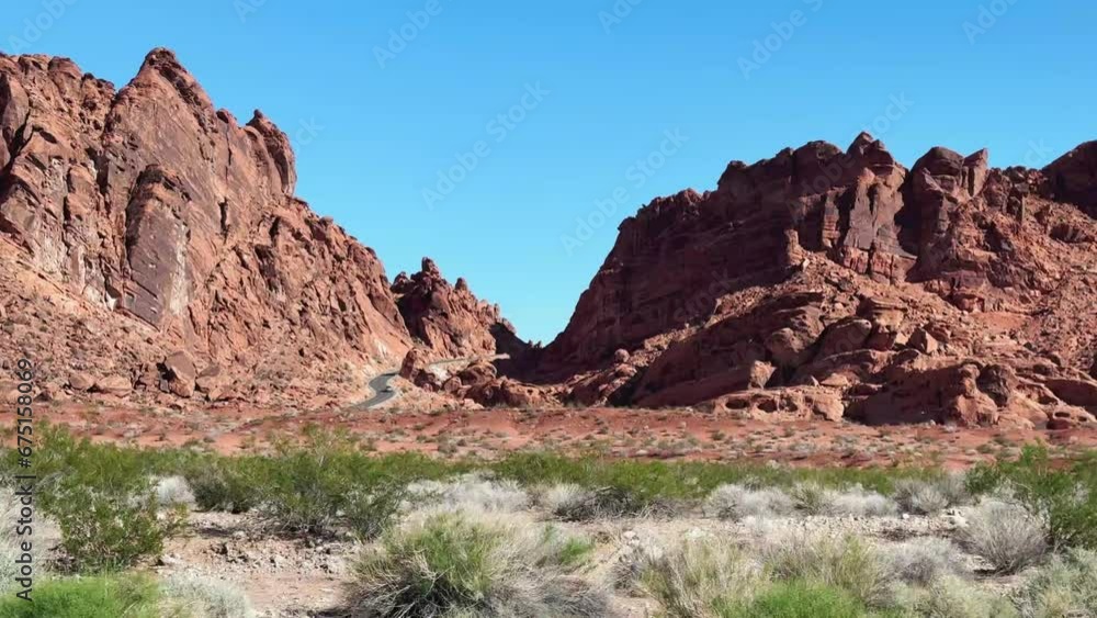 Passing rock formations and hills in the Valley of Fire state park, Nevada Passing rock formations and hills in the Valley of Fire state park, Nevada