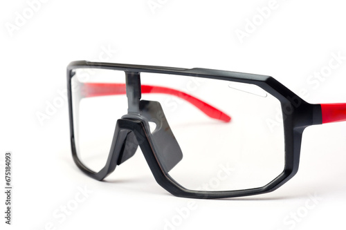 Cycling glasses for sports, unisex, plastic, with red temples.