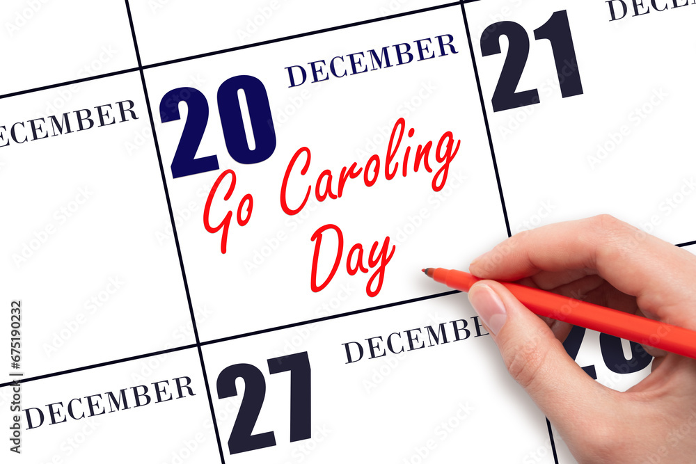 December 20. Hand writing text Go Caroling Day on calendar date. Save the date. Holiday. Day of the year concept. December 20. Hand writing text Go Caroling Day on calendar date. Save the date. Holiday. Day of the year concept.