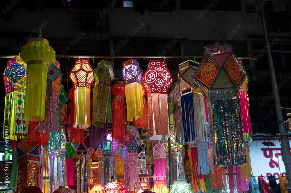 Fototapeta premium Mumbai , India - 7 November 2023, Kandil paper lanterns are hung for sale during Diwali festival at malad west Mumbai India