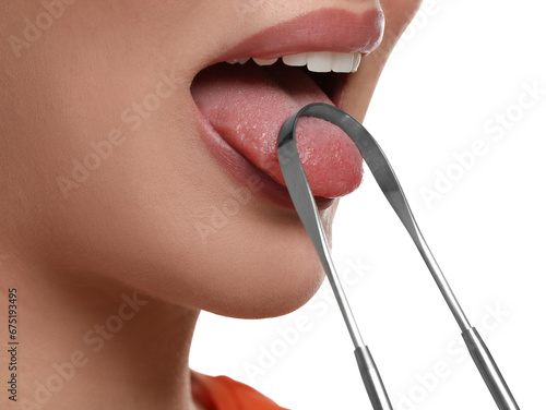 Woman brushing her tongue with cleaner on white background, closeup