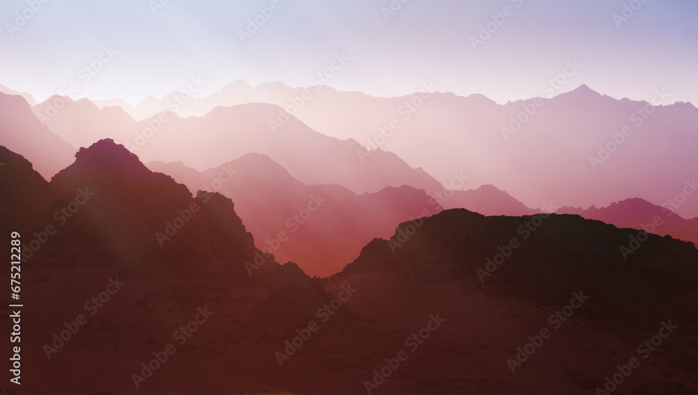 Mountainous terrain in vibrant pink shades. Abstract background. Futuristic landscape concept.