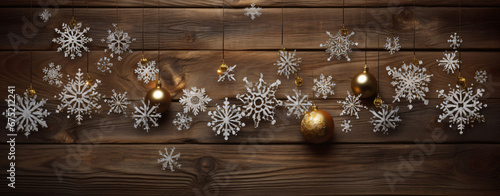 Christmas Ornament On Wooden Background With Snowfalls