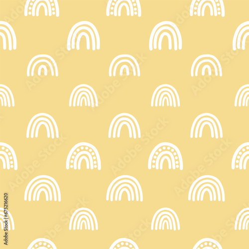 Beige seamless pattern with white rainbows