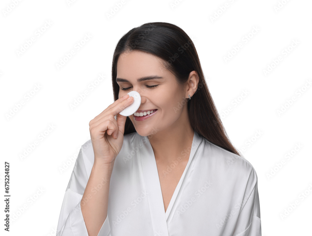 Young woman cleaning her face with cotton pad on white background Young woman cleaning her face with cotton pad on white background
