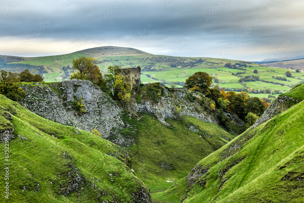 Peveril Castle, a ruined 11th-century castle overlooking the village of Castleton in Derbyshire, England